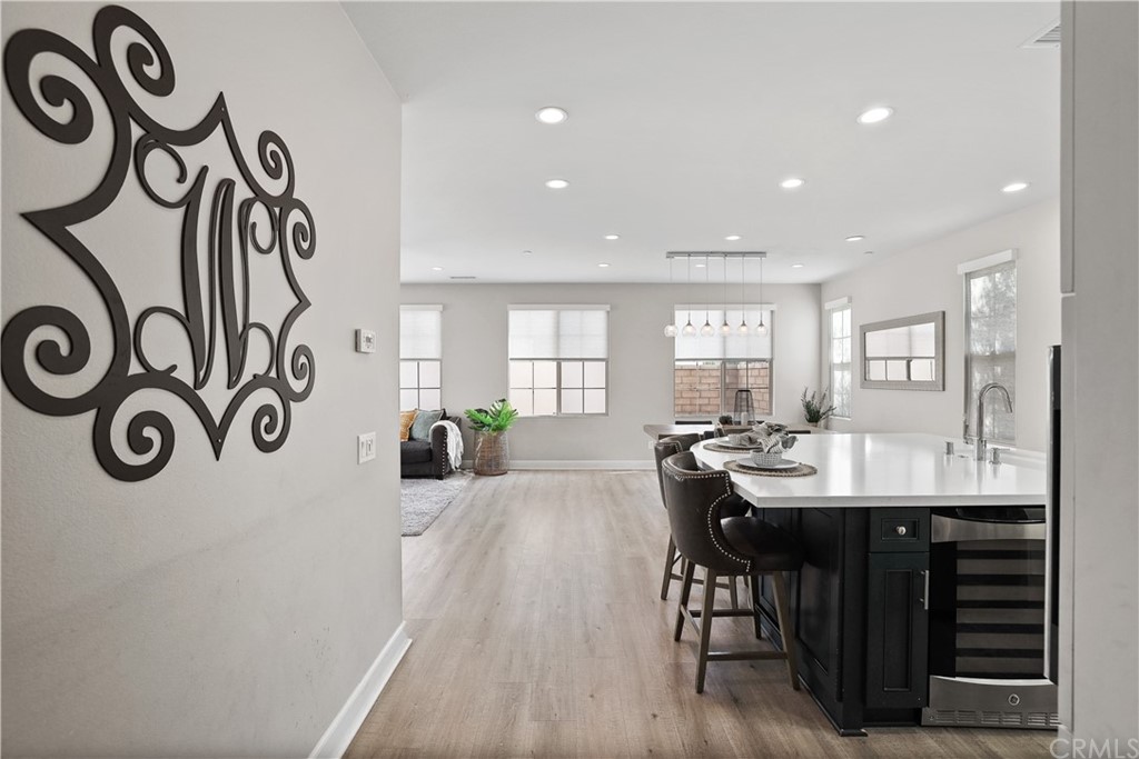 26 Lilac Lake Forest, CA 92630 - Photo 2 of 52 a view of a dining room with furniture and wooden floor