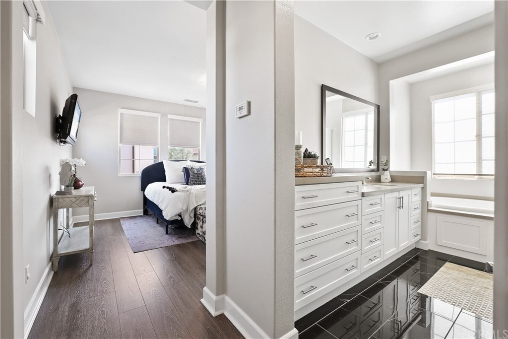 26 Lilac Lake Forest, CA 92630 - Photo 22 of 52 a bed room with a bed and a window