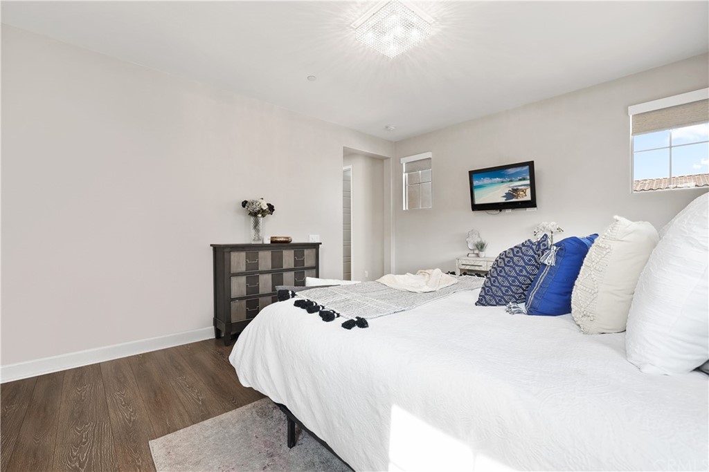 26 Lilac Lake Forest, CA 92630 - Photo 24 of 52 a bed sitting in a bedroom and a table