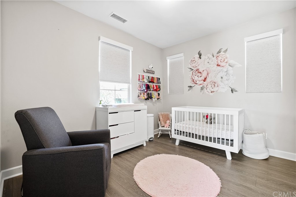 26 Lilac Lake Forest, CA 92630 - Photo 32 of 52 a room with furniture and a window