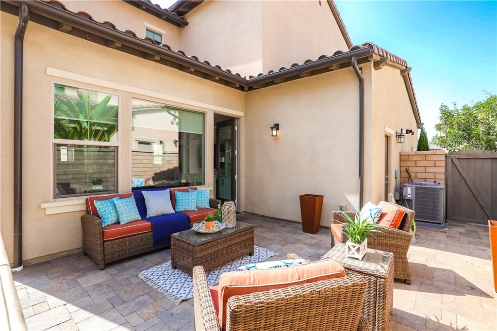 26 Lilac Lake Forest, CA 92630 - Photo 37 of 52 a outdoor living space with furniture and a rug