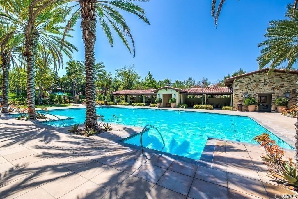 26 Lilac Lake Forest, CA 92630 - Photo 43 of 52 a view of a yard with a bench