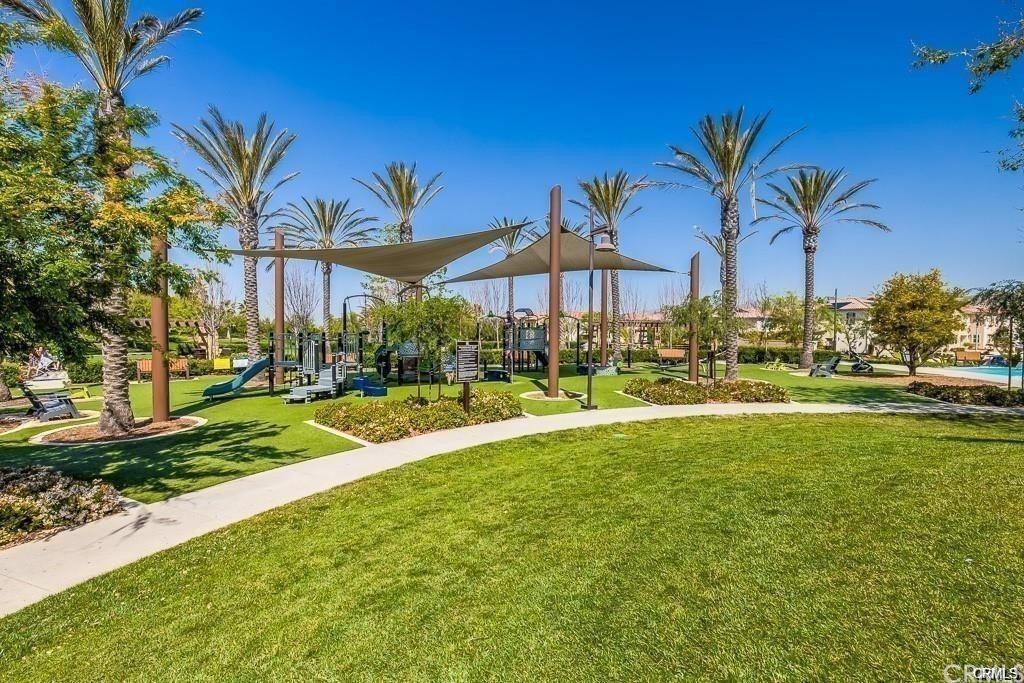 26 Lilac Lake Forest, CA 92630 - Photo 47 of 52 a view of a swimming pool with an outdoor space and seating area