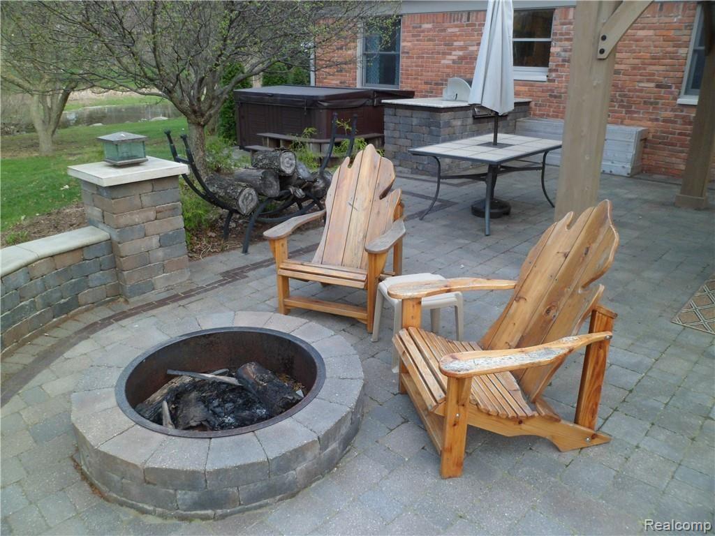 6914 Rattalee Lake Road Clarkston, MI 48348 - Photo 16 of 36 Enjoy a fire on your beautiful patio. 2 bags of Marshmallows and 6 Hershey Bars, with the purchase of this Home!