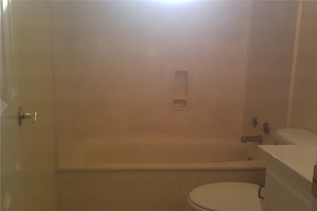 front view of a house with a small yard