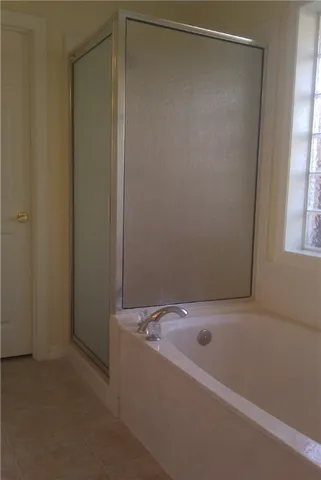 a bathroom with a bathtub