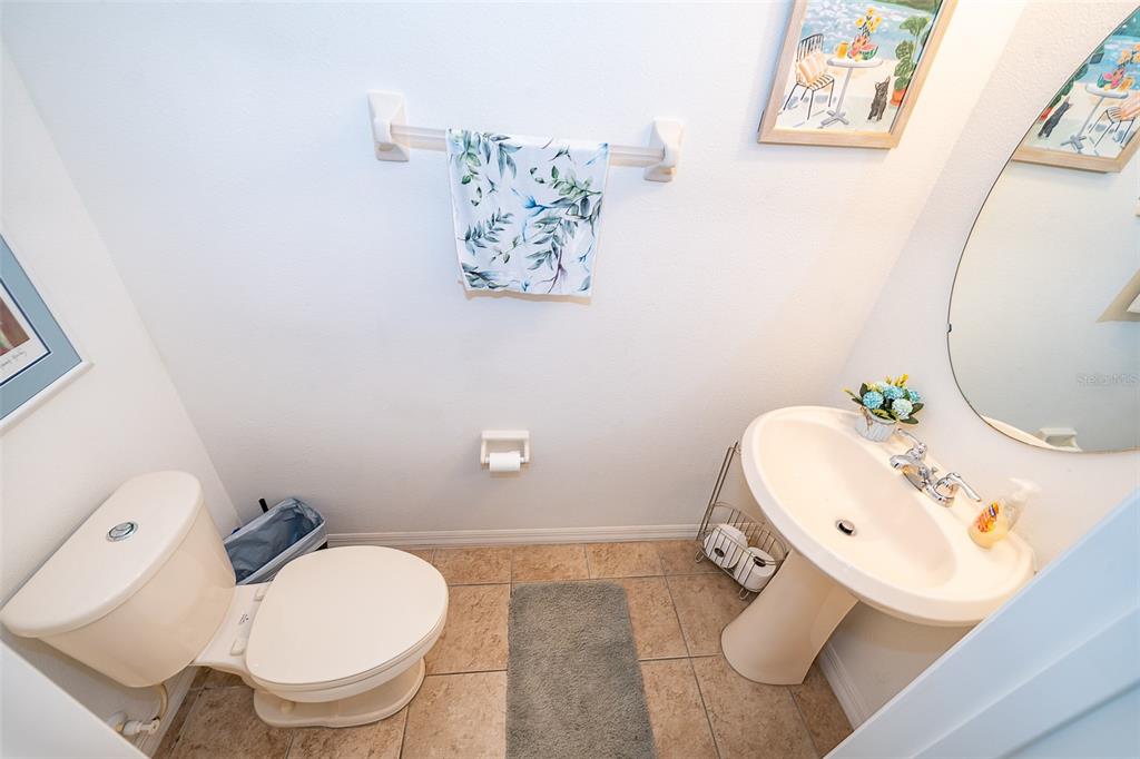 4113 Hedge Maple Place Winter Springs, FL 32708 - Photo 13 of 31 a bathroom with a sink and a mirror