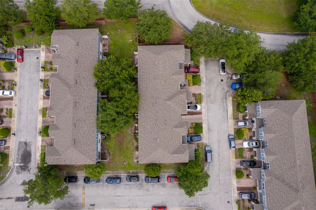 4113 Hedge Maple Place Winter Springs, FL 32708 - Photo 26 of 31 an aerial view of multiple houses with outdoor space