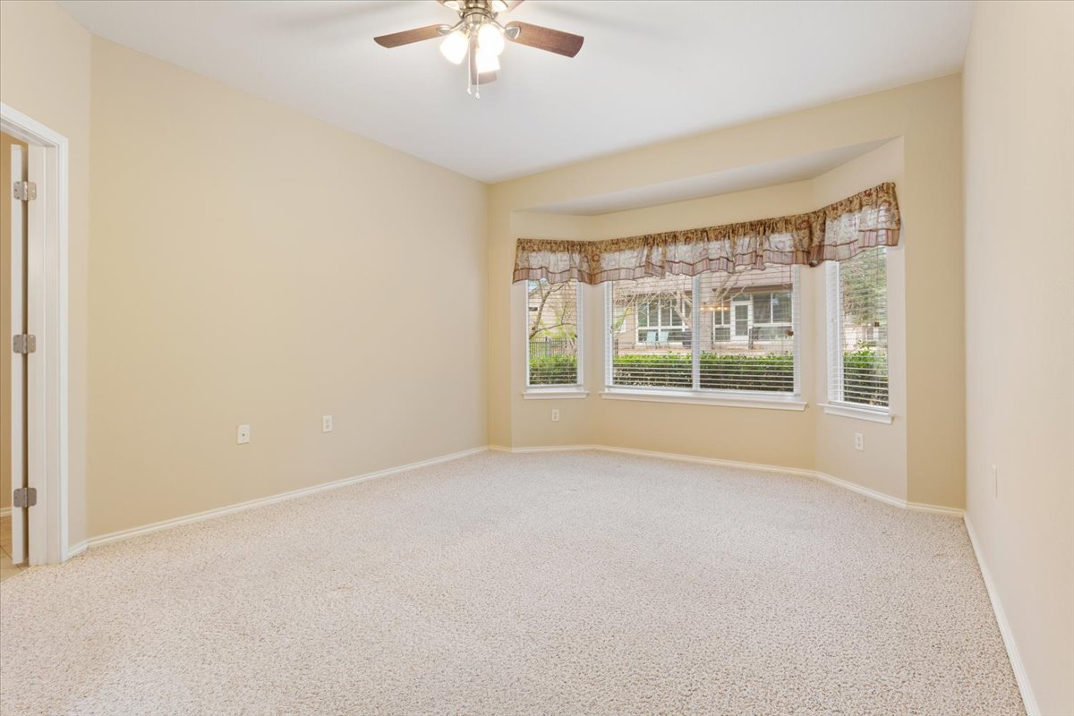 246 Red Poppy Trail Georgetown, TX 78633 - Photo 18 of 32 an empty room with a window