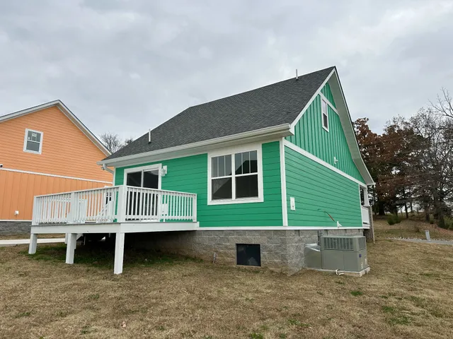 a view of room with air conditioner and window