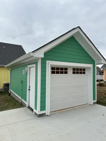 a kitchen with refrigerator cabinets and a sink