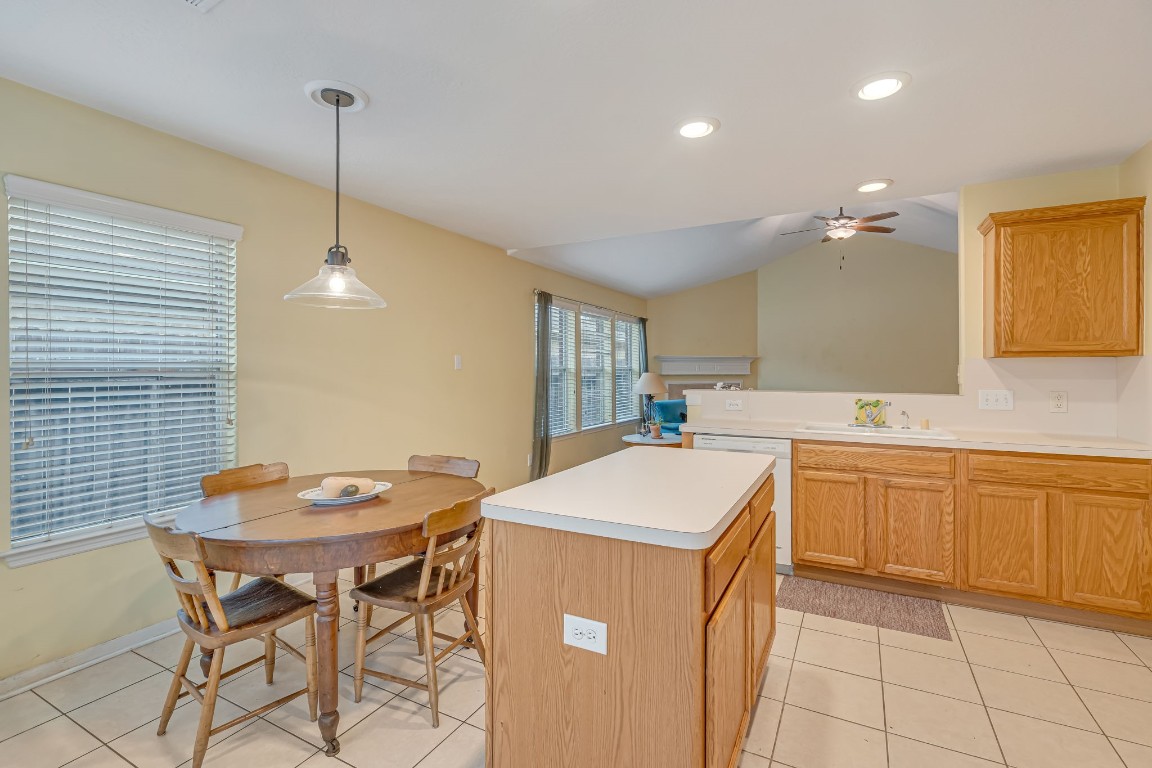 4614 Neches Trail Lane Spring, TX 77388 - Photo 14 of 29 a kitchen that has a sink a table and chairs in it