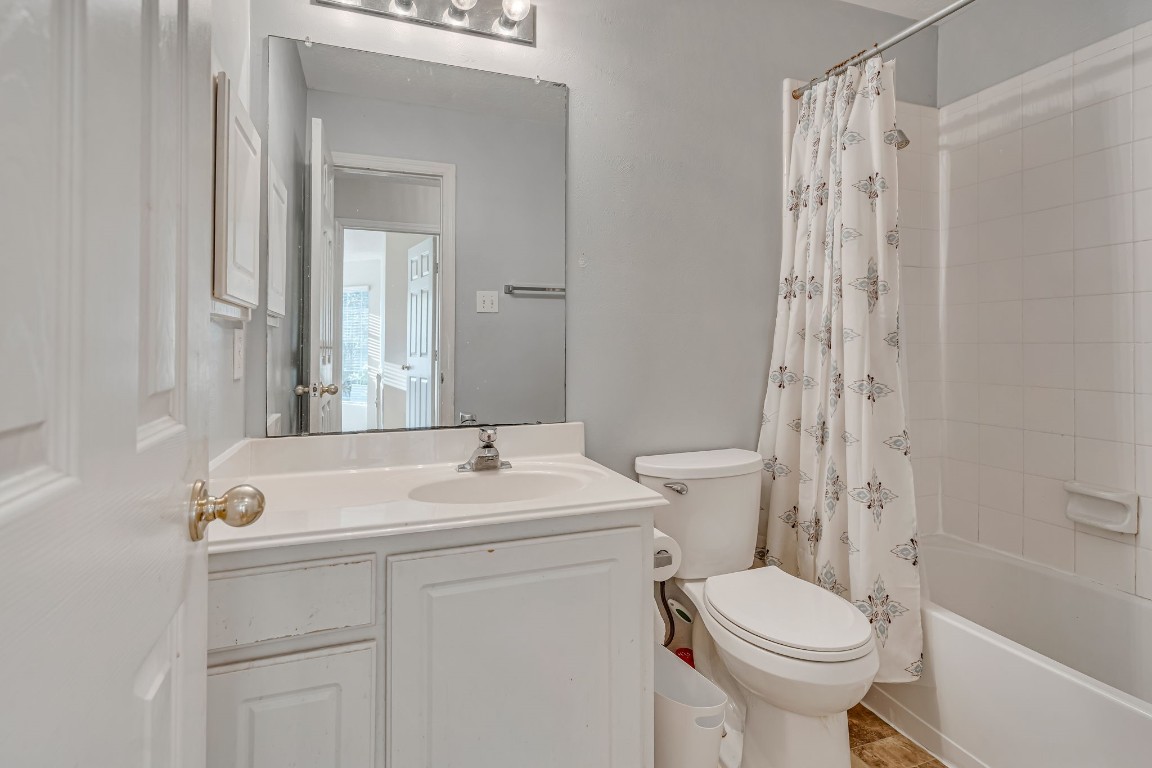 4614 Neches Trail Lane Spring, TX 77388 - Photo 23 of 29 a bathroom with a sink a toilet and shower