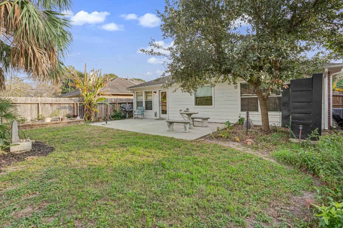 4614 Neches Trail Lane Spring, TX 77388 - Photo 27 of 29 a front view of a house with garden
