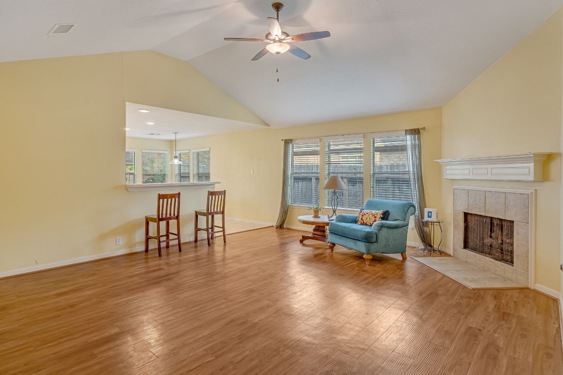 4614 Neches Trail Lane Spring, TX 77388 - Photo 6 of 29 a living room with furniture and a fireplace