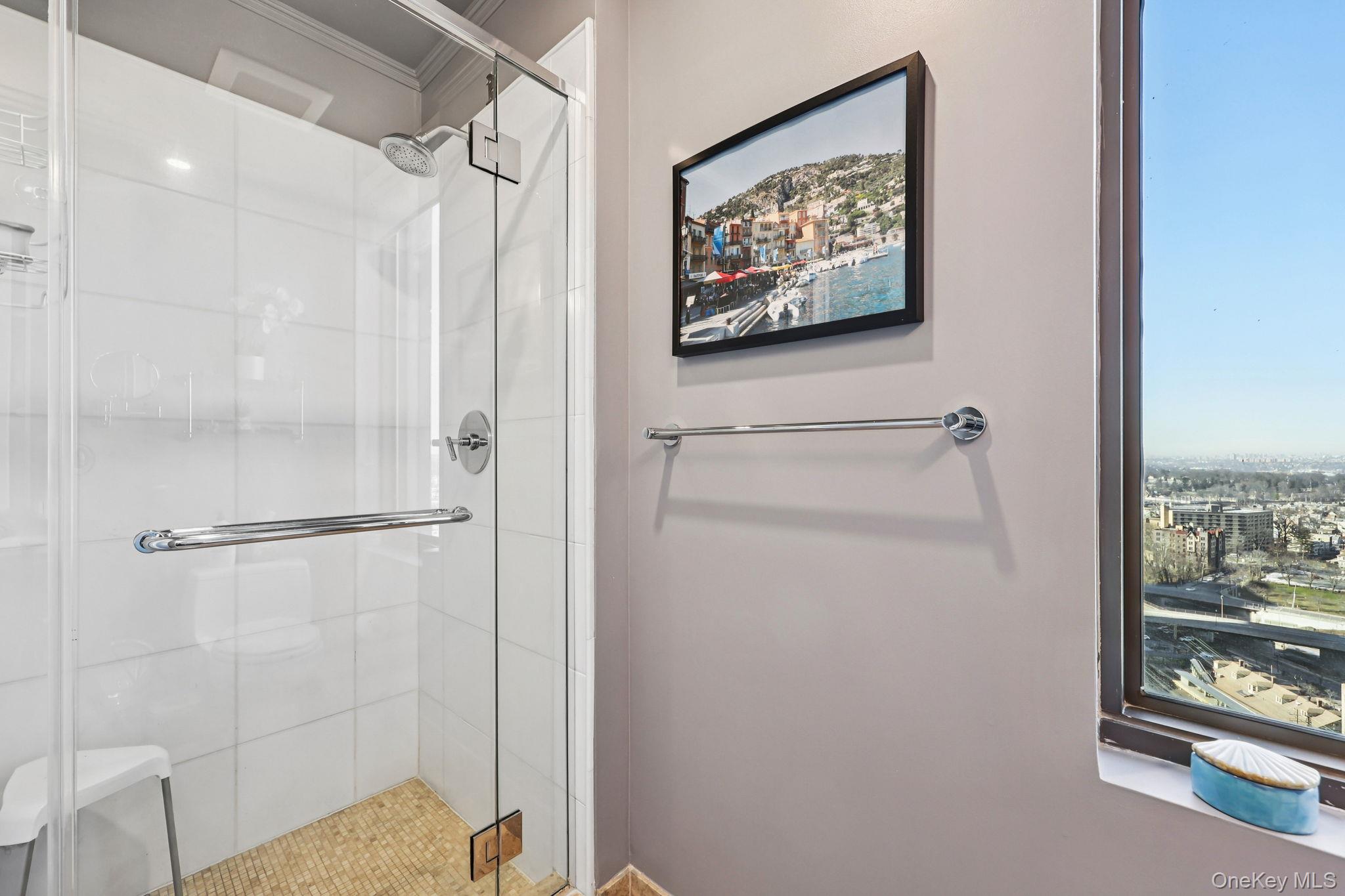 175 Huguenot Street, Unit 2503 New Rochelle, NY 10801 - Photo 7 of 32 a bathroom with a shower and a sink