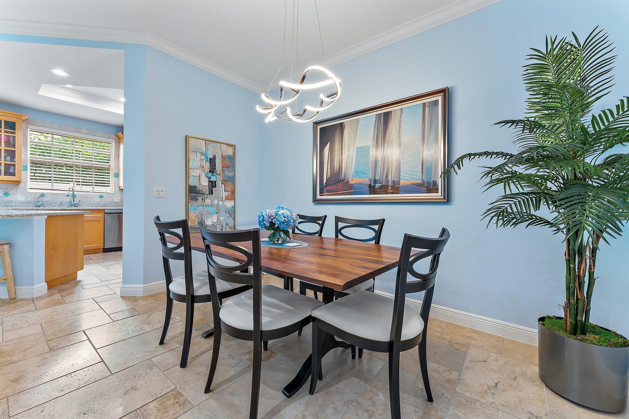 455 Ocean Ridge Way Juno Beach, FL 33408 - Photo 14 of 39 a dining room with furniture and window