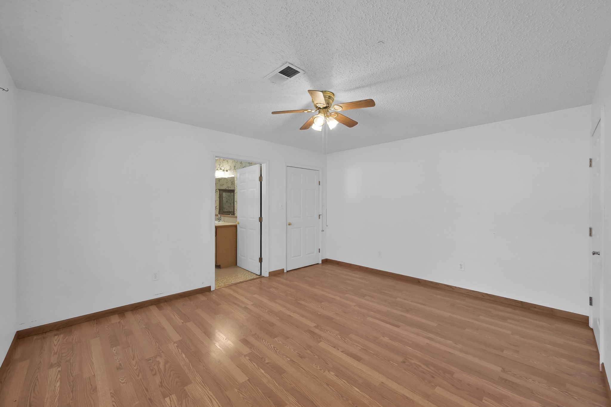 121 Magnolia Boulevard New Caney, TX 77357 - Photo 18 of 39 a view of an empty room with a window