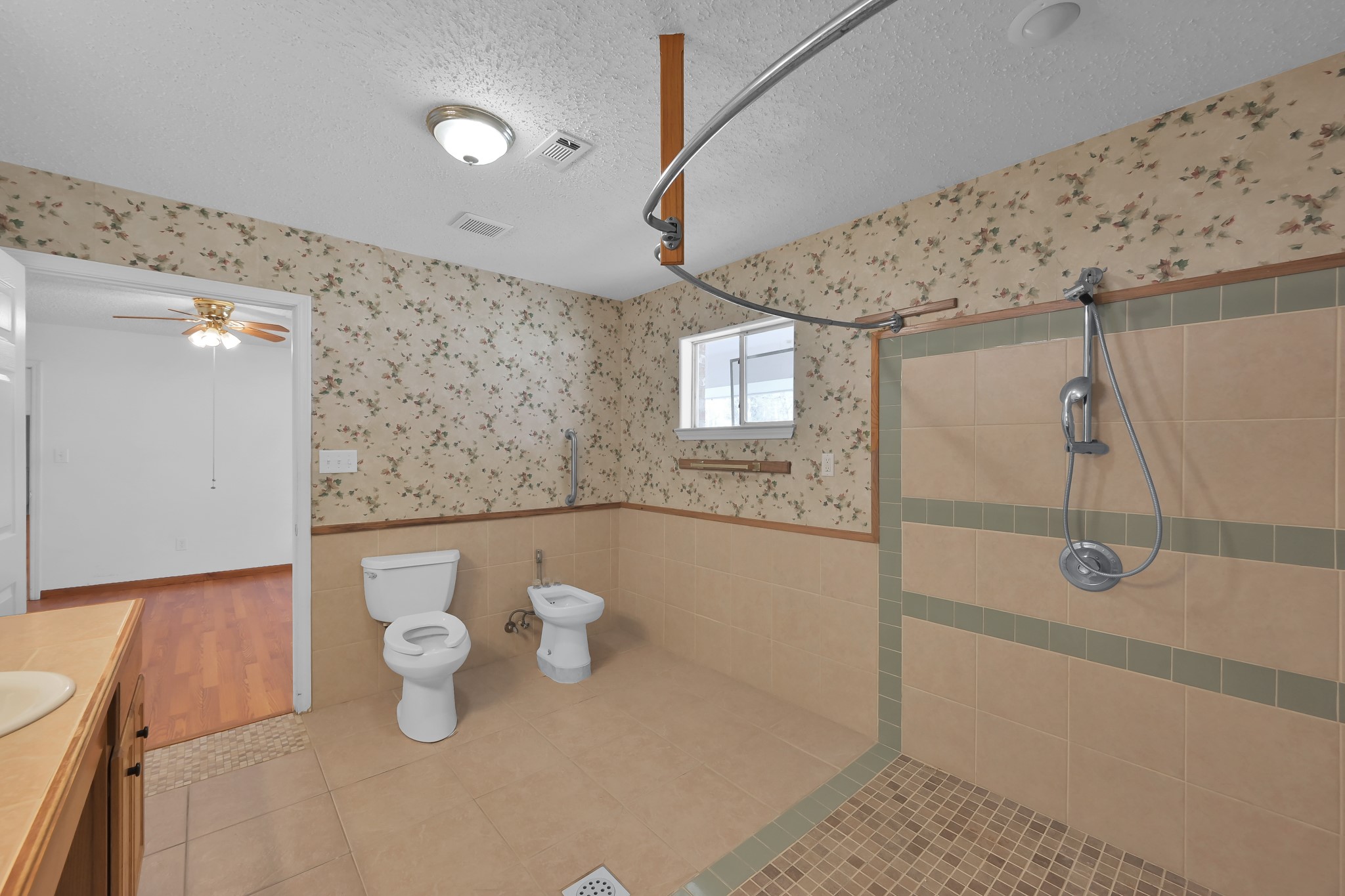121 Magnolia Boulevard New Caney, TX 77357 - Photo 20 of 39 a bathroom with a sink and a mirror