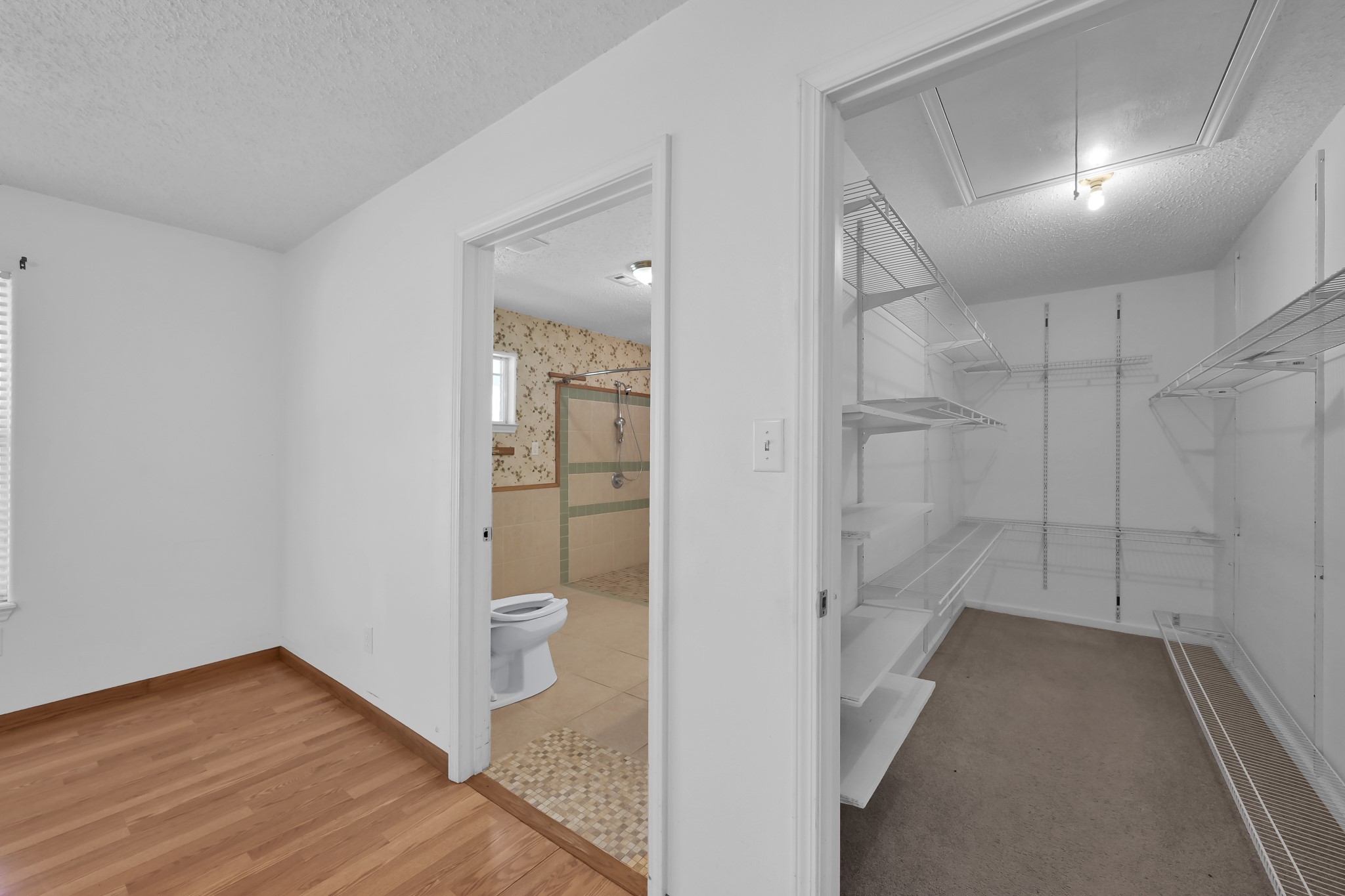 121 Magnolia Boulevard New Caney, TX 77357 - Photo 21 of 39 a view of a hallway with wooden floor