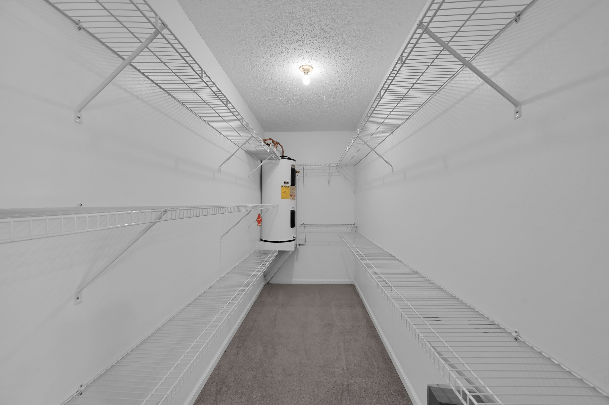 121 Magnolia Boulevard New Caney, TX 77357 - Photo 28 of 39 a view of a hallway with stairs