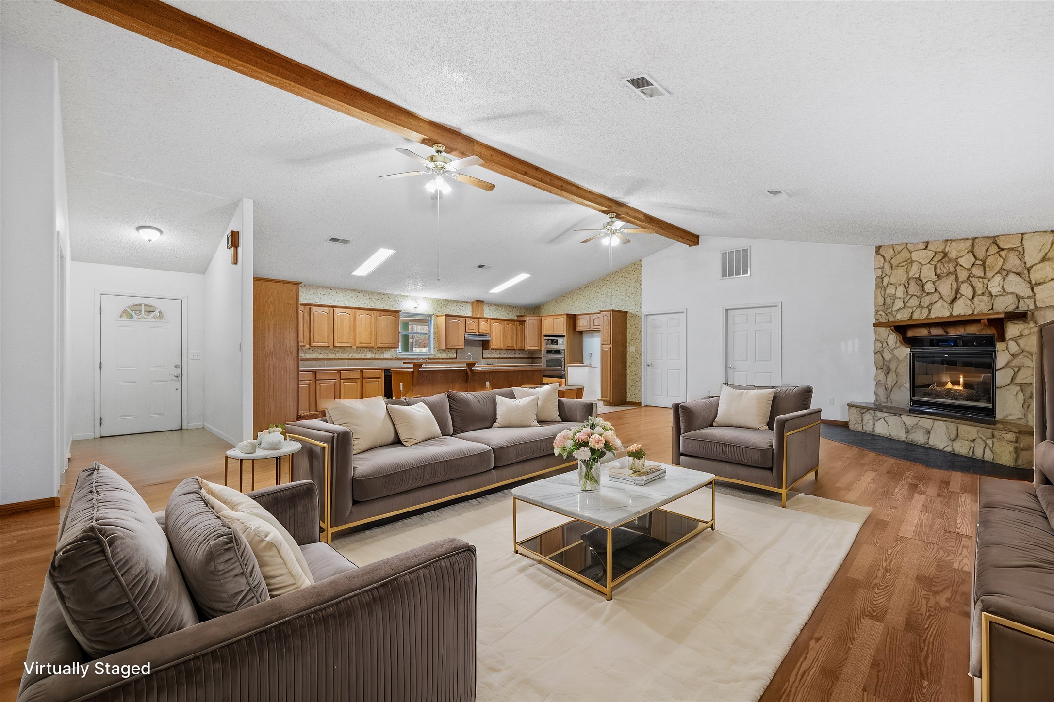 121 Magnolia Boulevard New Caney, TX 77357 - Photo 6 of 39 a living room with furniture and a fireplace