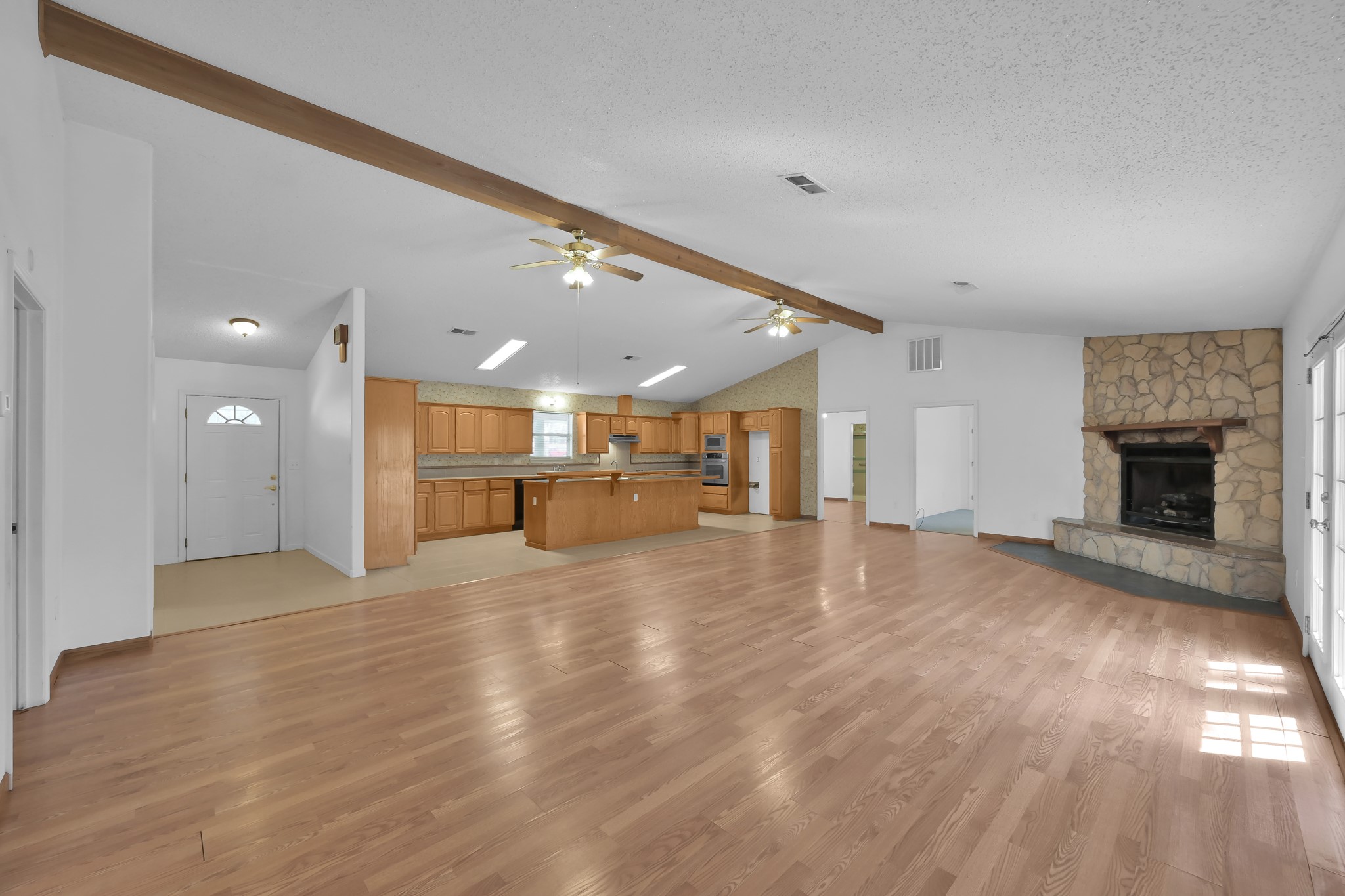 121 Magnolia Boulevard New Caney, TX 77357 - Photo 7 of 39 a view of a livingroom with a fireplace