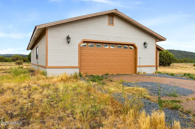 a view of a garage with furniture