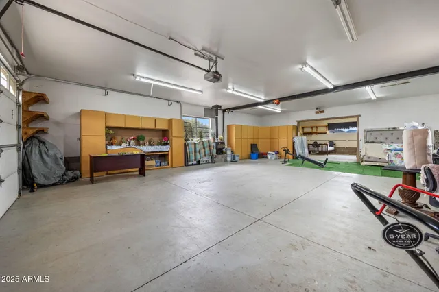 a house with swimming pool in front of it