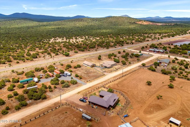 a view of an ocean with a mountain
