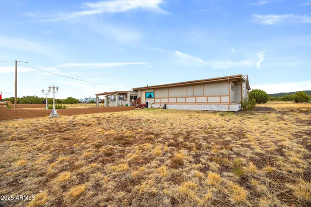 a view of swimming pool from a balcony