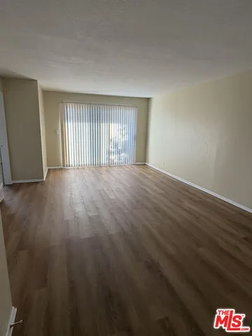 a view of storage and utility room with washer and dryer