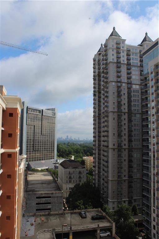 1101 Juniper Street Northeast, Unit 1416 Atlanta, GA 30309 - Photo 6 of 48 a view of a tall building