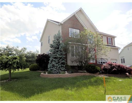 24 Lexington Road Monmouth Junction, NJ 08852 - Photo 2 of 21 a front view of a house with a garden