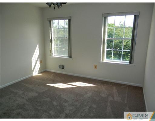 24 Lexington Road Monmouth Junction, NJ 08852 - Photo 12 of 21 a view of an empty room with a window