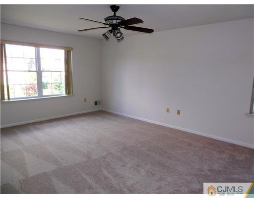 24 Lexington Road Monmouth Junction, NJ 08852 - Photo 16 of 21 an empty room with windows
