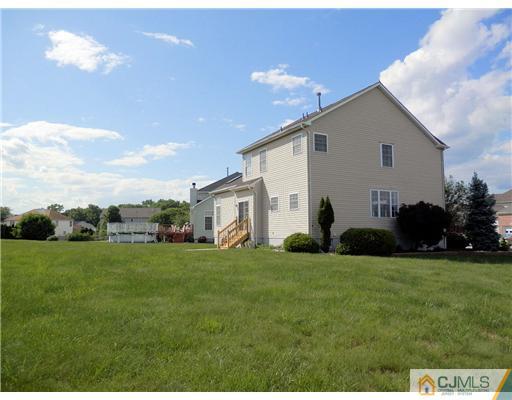 24 Lexington Road Monmouth Junction, NJ 08852 - Photo 20 of 21 a view of a backyard of the house