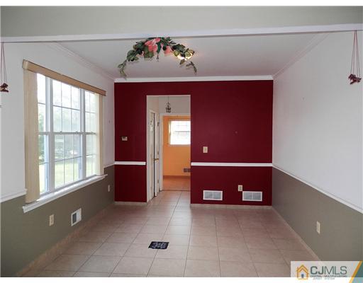 24 Lexington Road Monmouth Junction, NJ 08852 - Photo 6 of 21 a view of livingroom with furniture and windows
