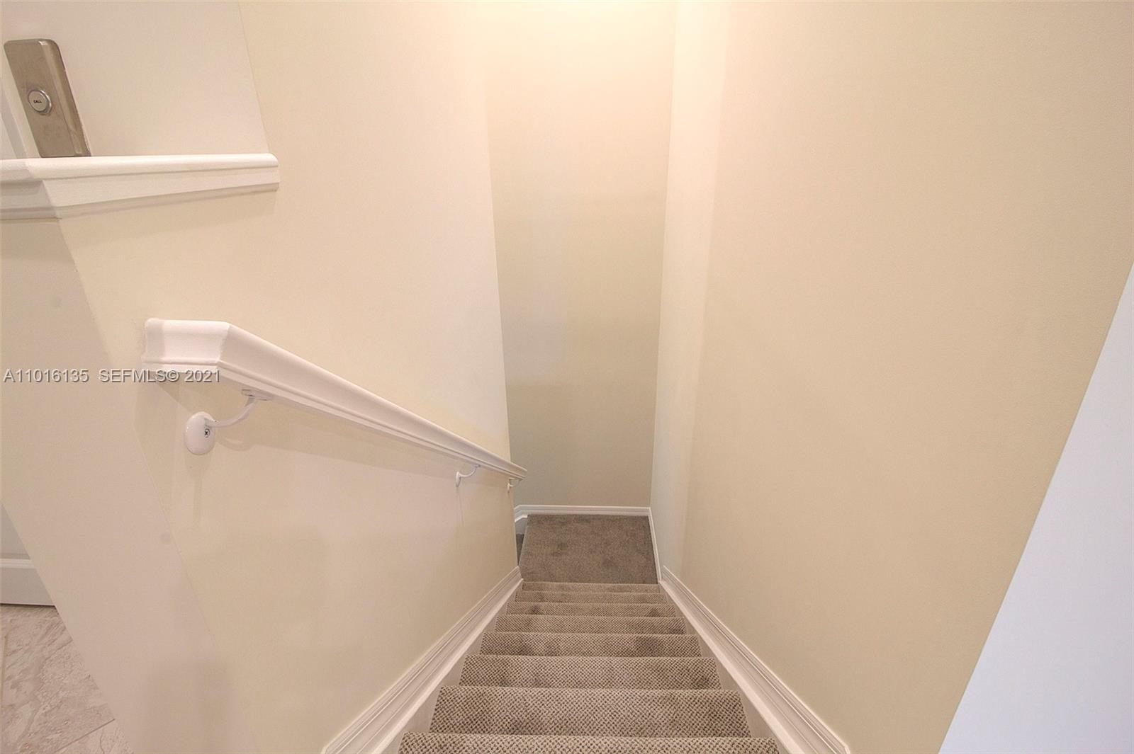 9127 Passiflora Way, Unit 201 Boca Raton, FL 33428 - Photo 21 of 31 newly upgraded with berber carpeting on steps