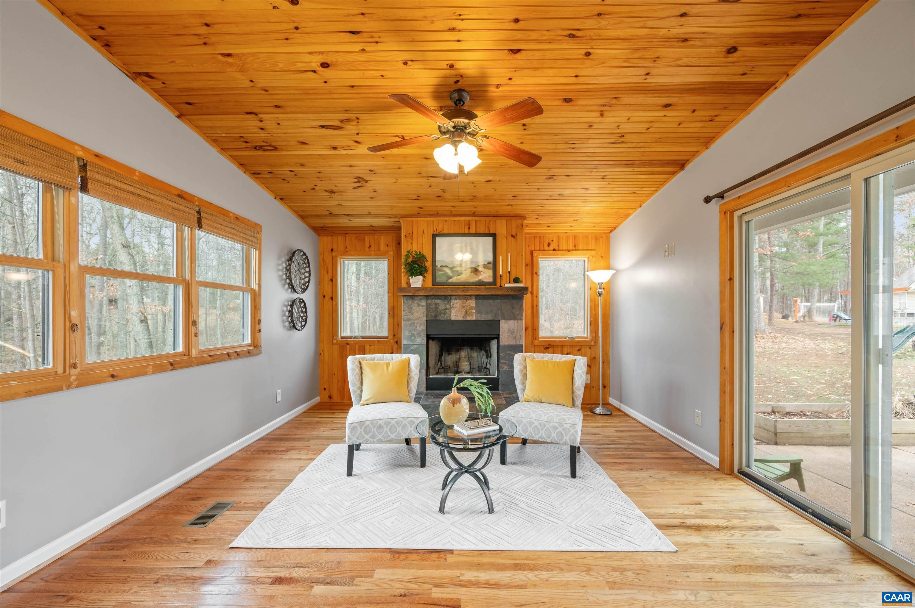 139 Fox Hollow Road Ruckersville, VA 22968 - Photo 14 of 54 a living room with furniture and a fireplace