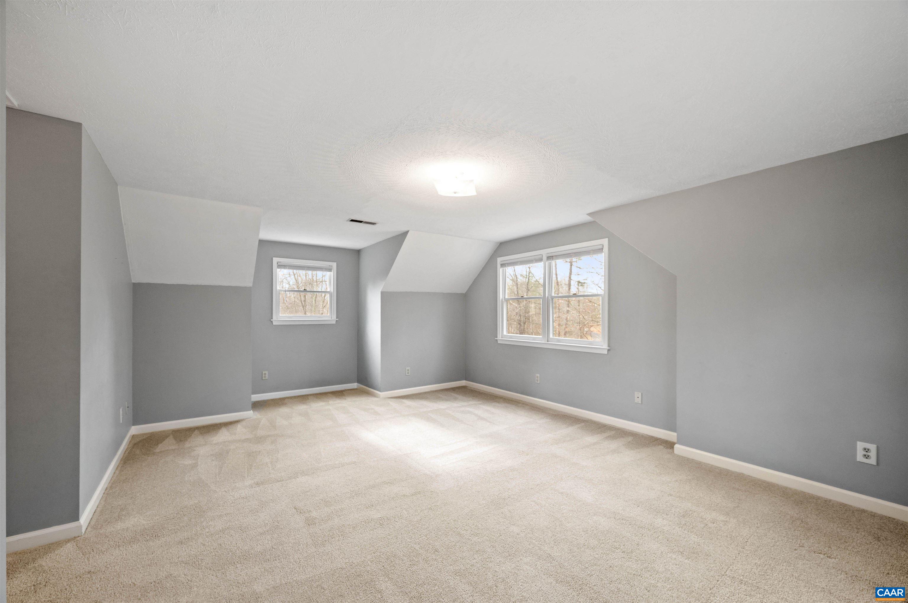 139 Fox Hollow Road Ruckersville, VA 22968 - Photo 28 of 54 an empty room with windows
