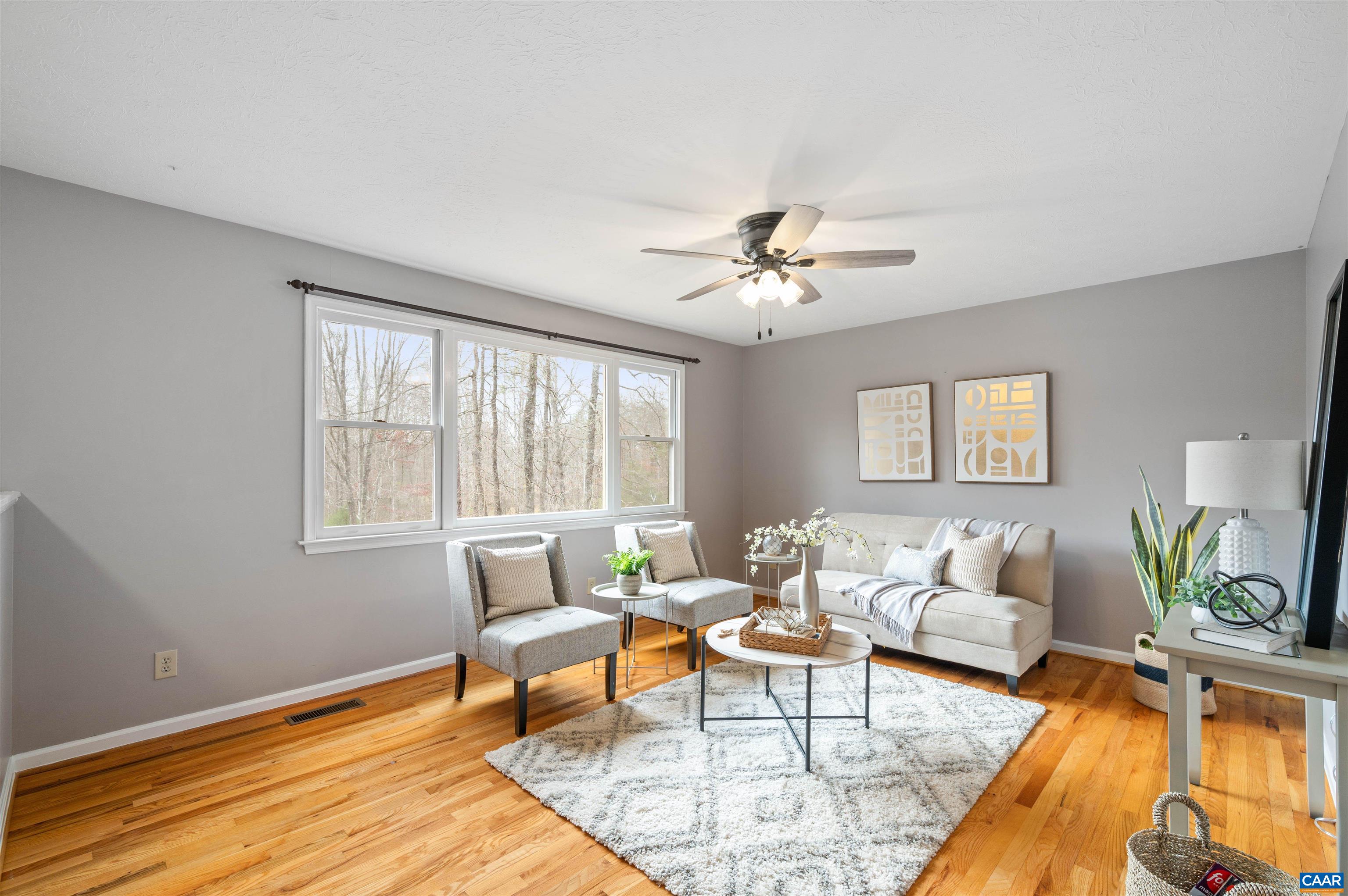 139 Fox Hollow Road Ruckersville, VA 22968 - Photo 3 of 54 a living room with furniture and wooden floor