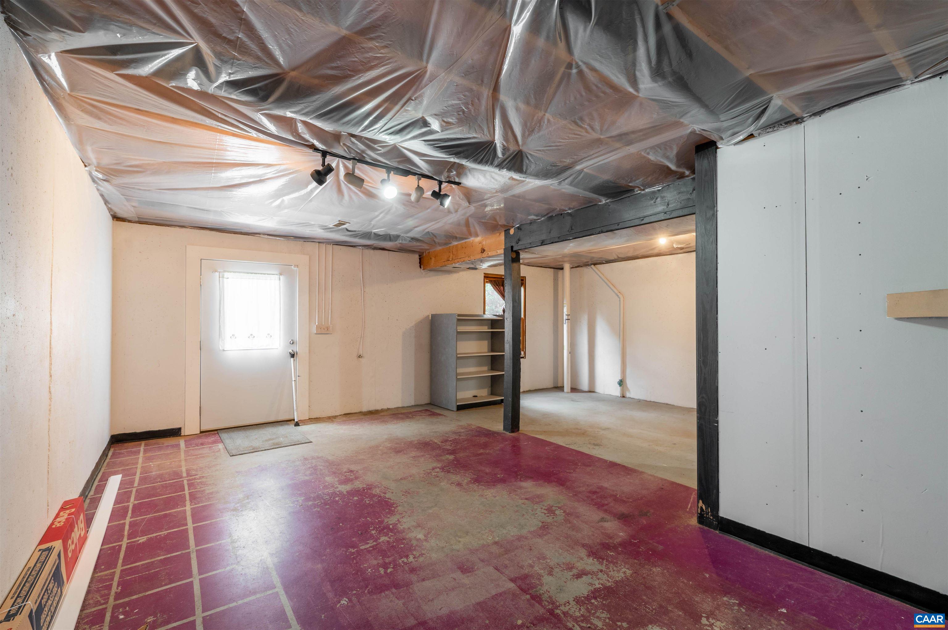139 Fox Hollow Road Ruckersville, VA 22968 - Photo 35 of 54 a view of a hallway with wooden floor