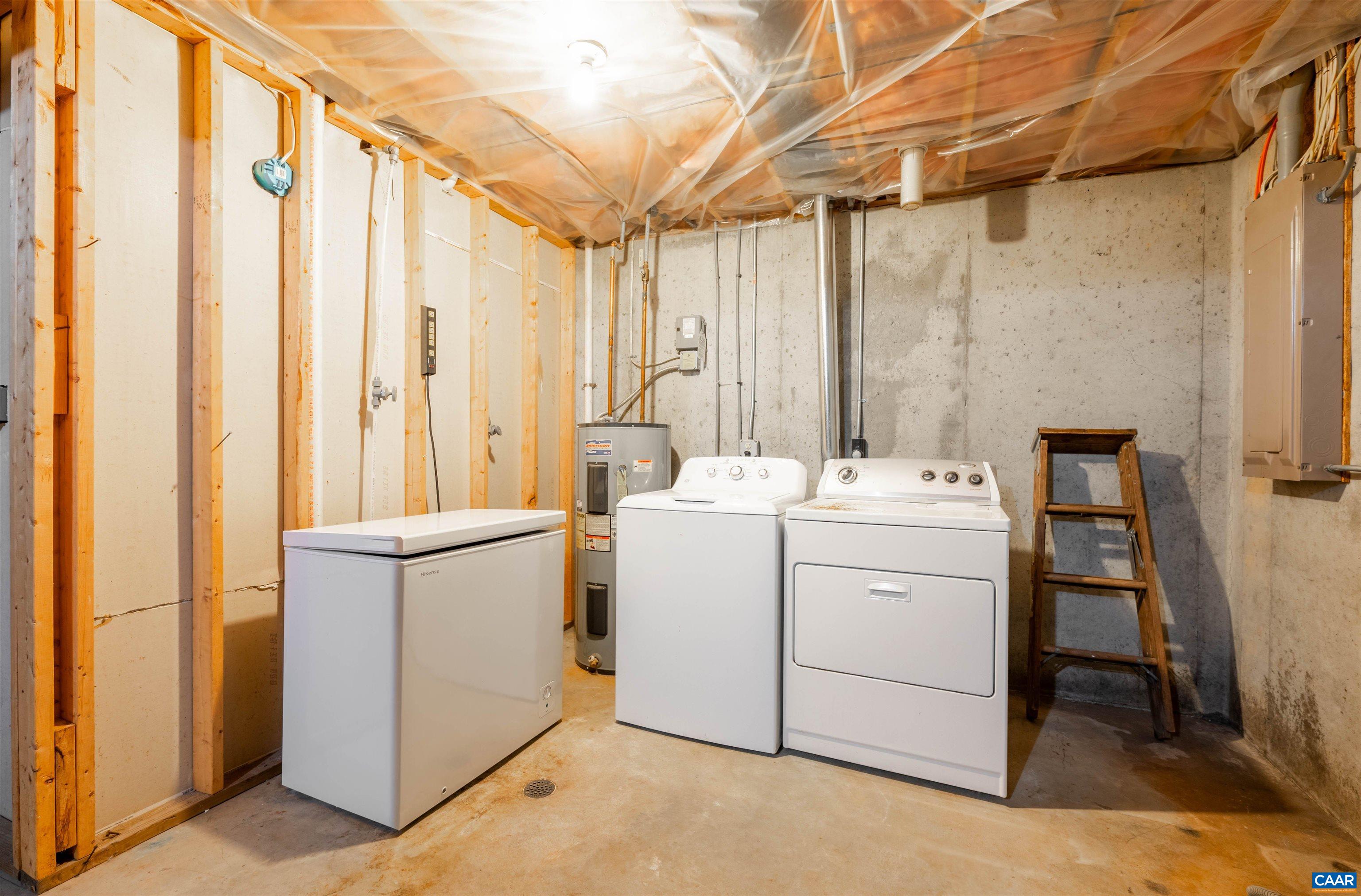 139 Fox Hollow Road Ruckersville, VA 22968 - Photo 40 of 54 a utility room with dryer and washer