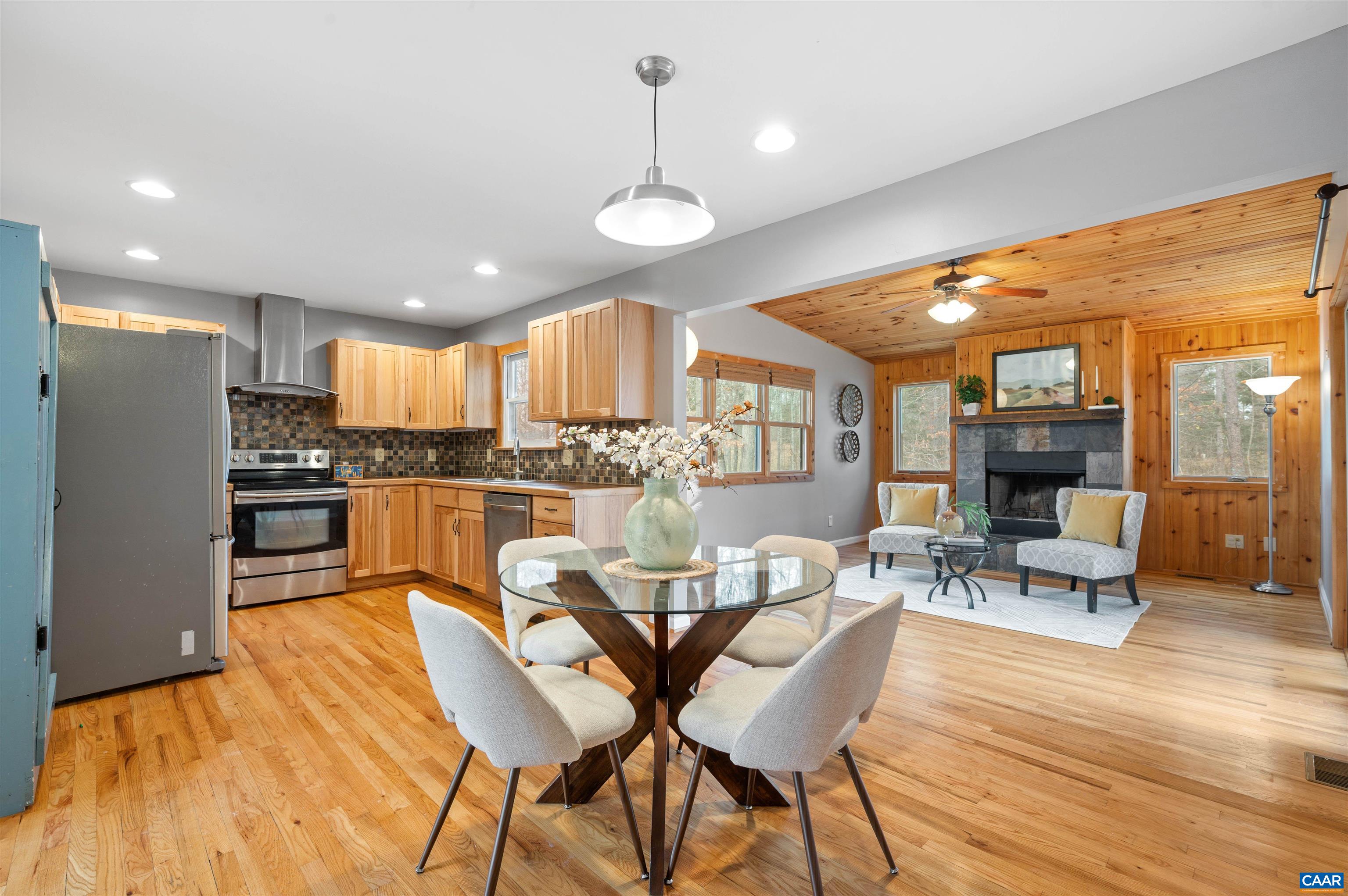 139 Fox Hollow Road Ruckersville, VA 22968 - Photo 5 of 54 a view of a dining room with furniture and wooden floor