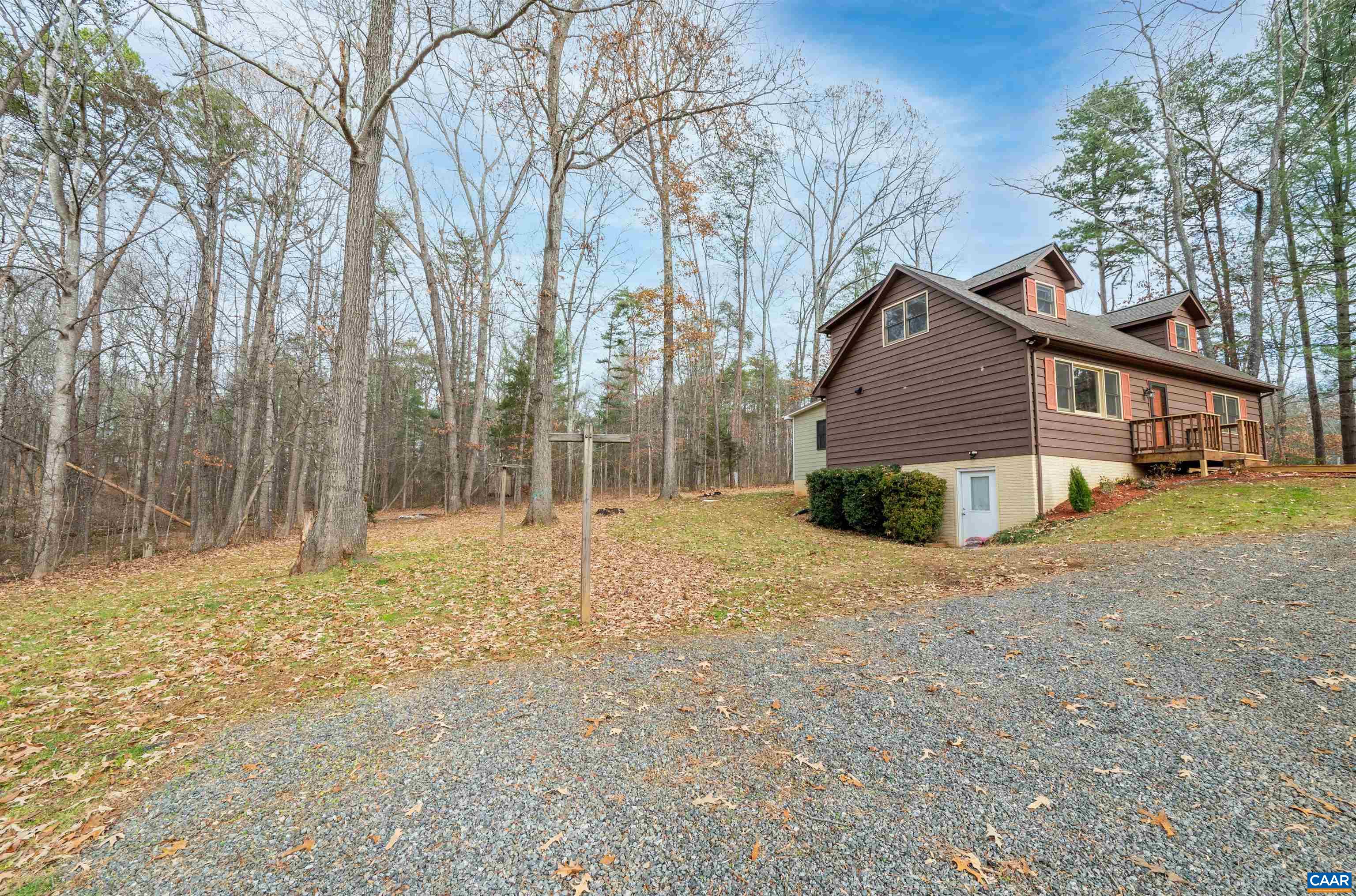 139 Fox Hollow Road Ruckersville, VA 22968 - Photo 51 of 54 a house that has a tree in front of it