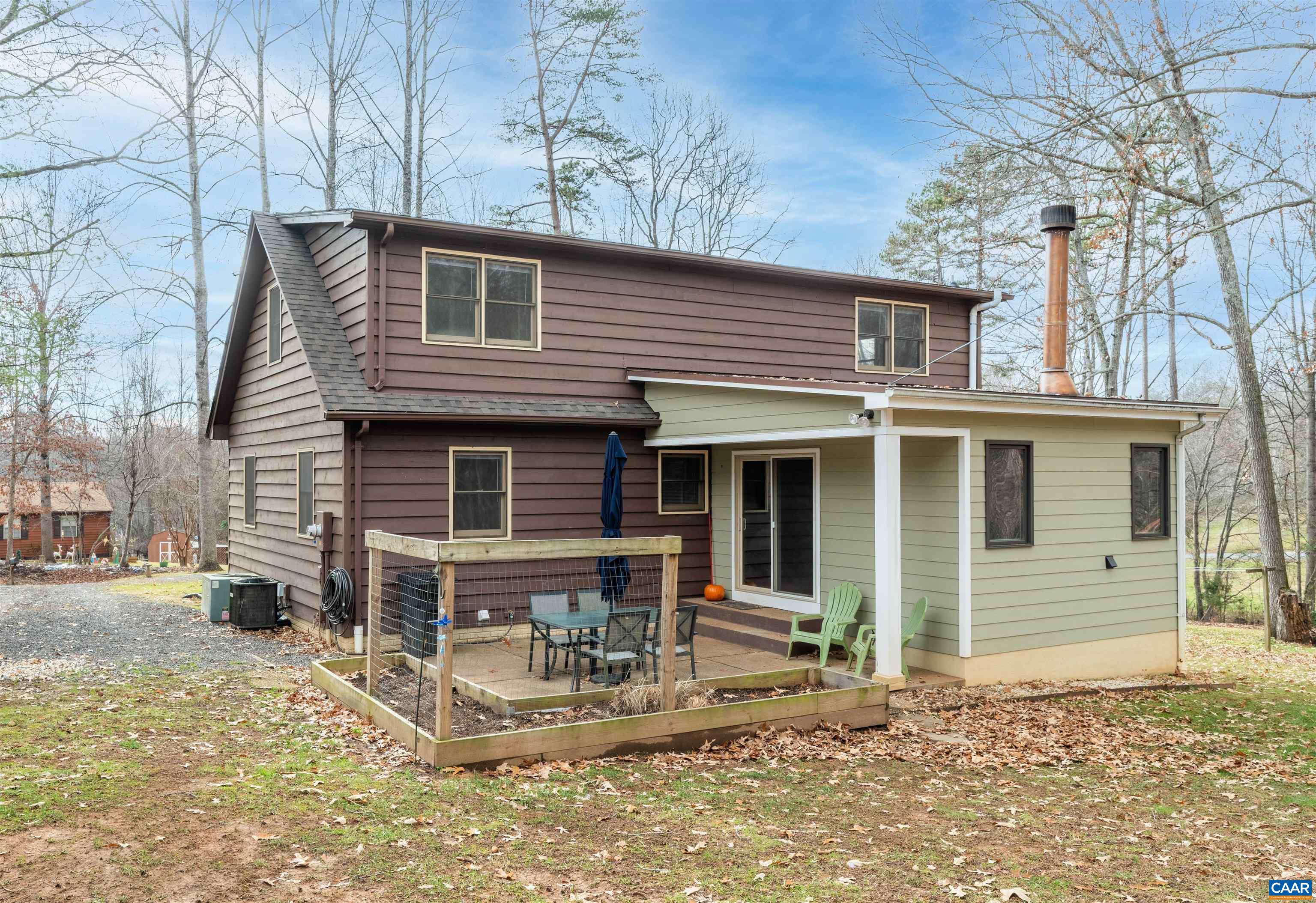 139 Fox Hollow Road Ruckersville, VA 22968 - Photo 52 of 54 a front view of a house with garden