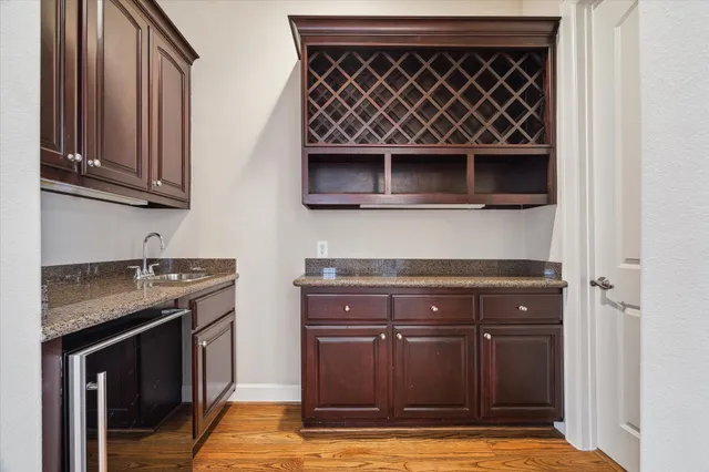 a kitchen with stainless steel appliances granite countertop a stove and a microwave