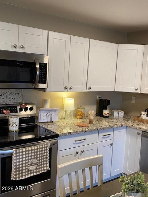 1440 North Idaho Road, Unit 2101 Apache Junction, AZ 85119 - Photo 9 of 23 1440 N Idaho #2101 Kitchen Dining Pic 5