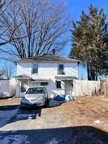 a car parked in front of house